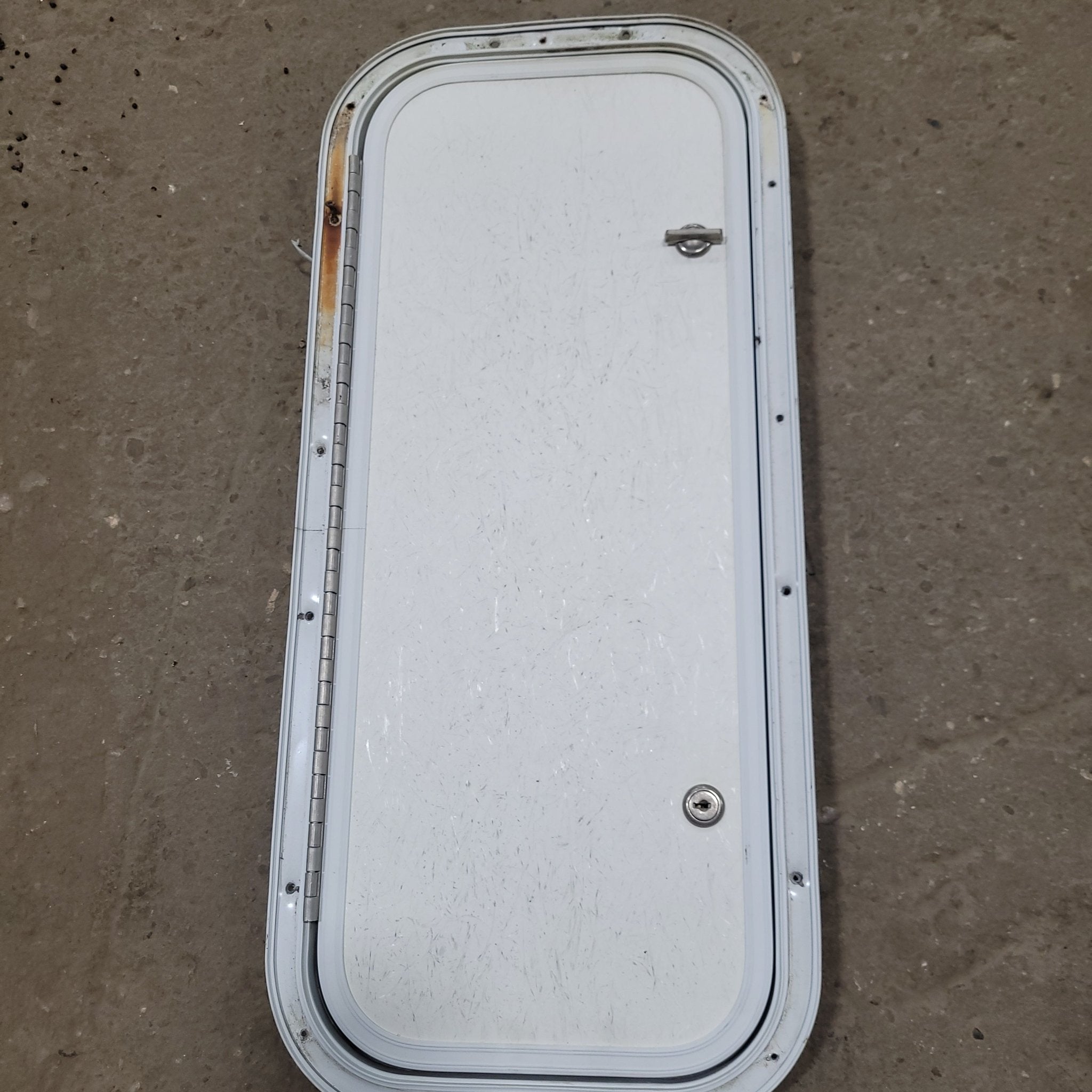 Used Radius Cargo / compartment Door 23 3/4" X 9 7/8" X 1/2"D - Young Farts RV Parts