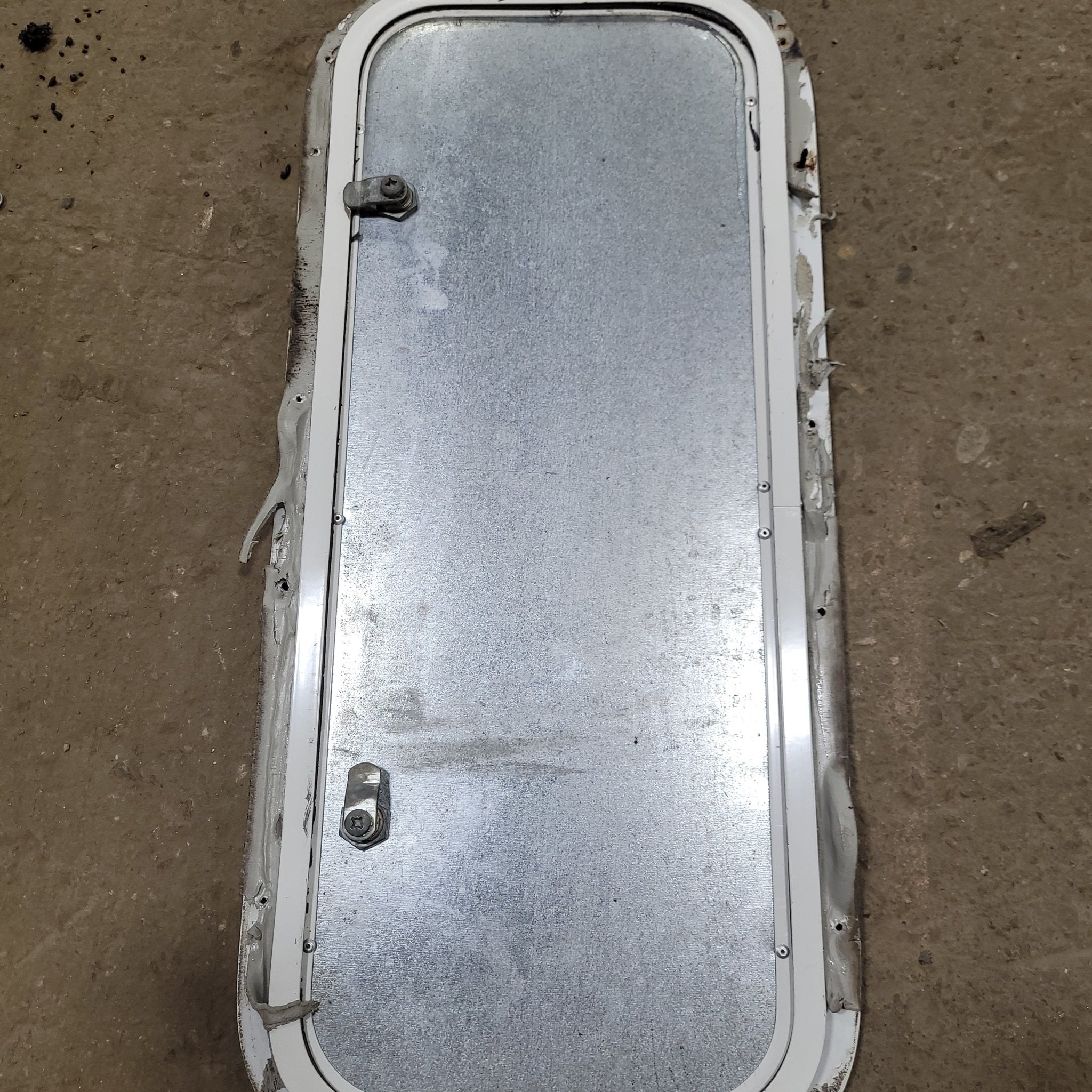 Used Radius Cargo / compartment Door 23 3/4" X 9 7/8" X 1/2"D - Young Farts RV Parts