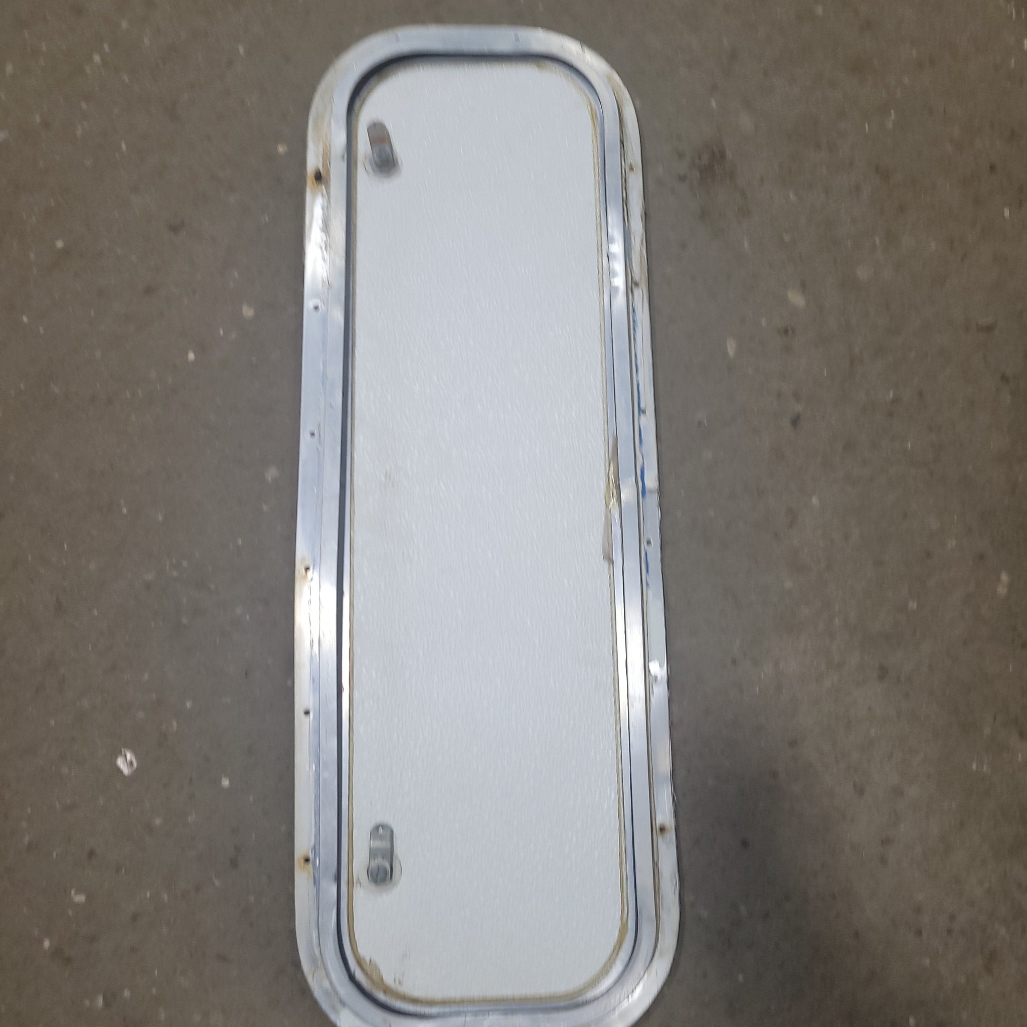 Used Radius Cargo / compartment Door 32 1/2" X 10 1/2" X 5/8"D - Young Farts RV Parts