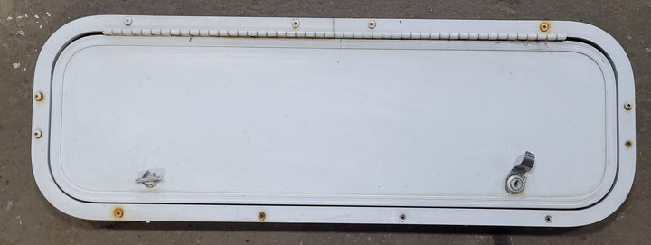 Used Radius Cornered Cargo Door 29 3/4" W x 9 3/8" H x 1 7/8" D - Young Farts RV Parts