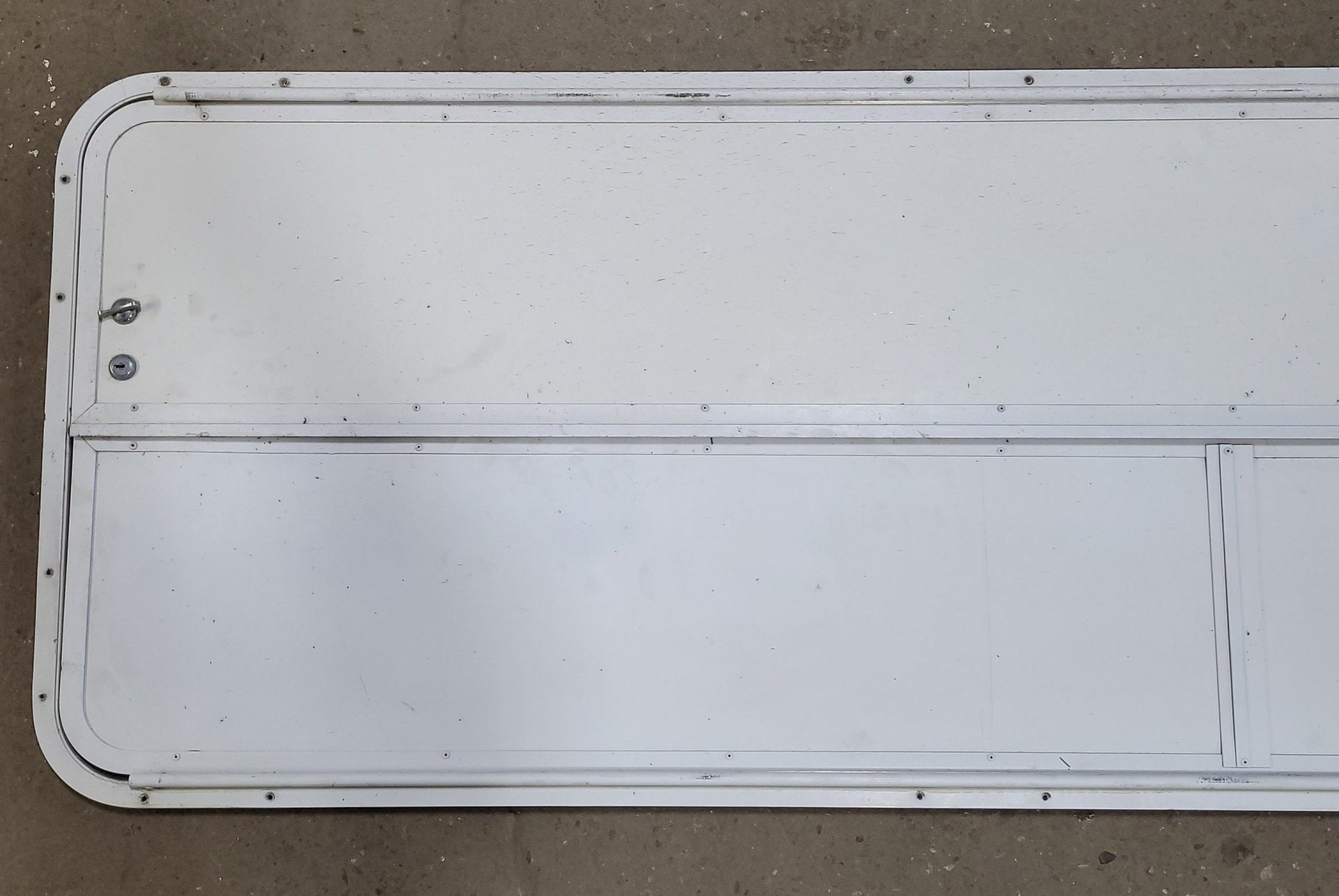 Used Radius Cornered Cargo Door 59 7/8" x 22 7/8" X 1/2" D - Young Farts RV Parts