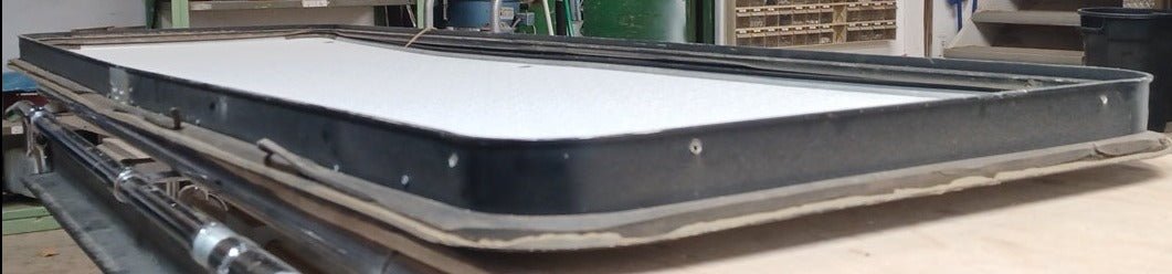 Used Radius Cornered Cargo Door 69 5/8" x 21 7/8" x 2" D - Young Farts RV Parts