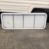 Used Radius Opening Rock Guard Covered Window: 59 3/4