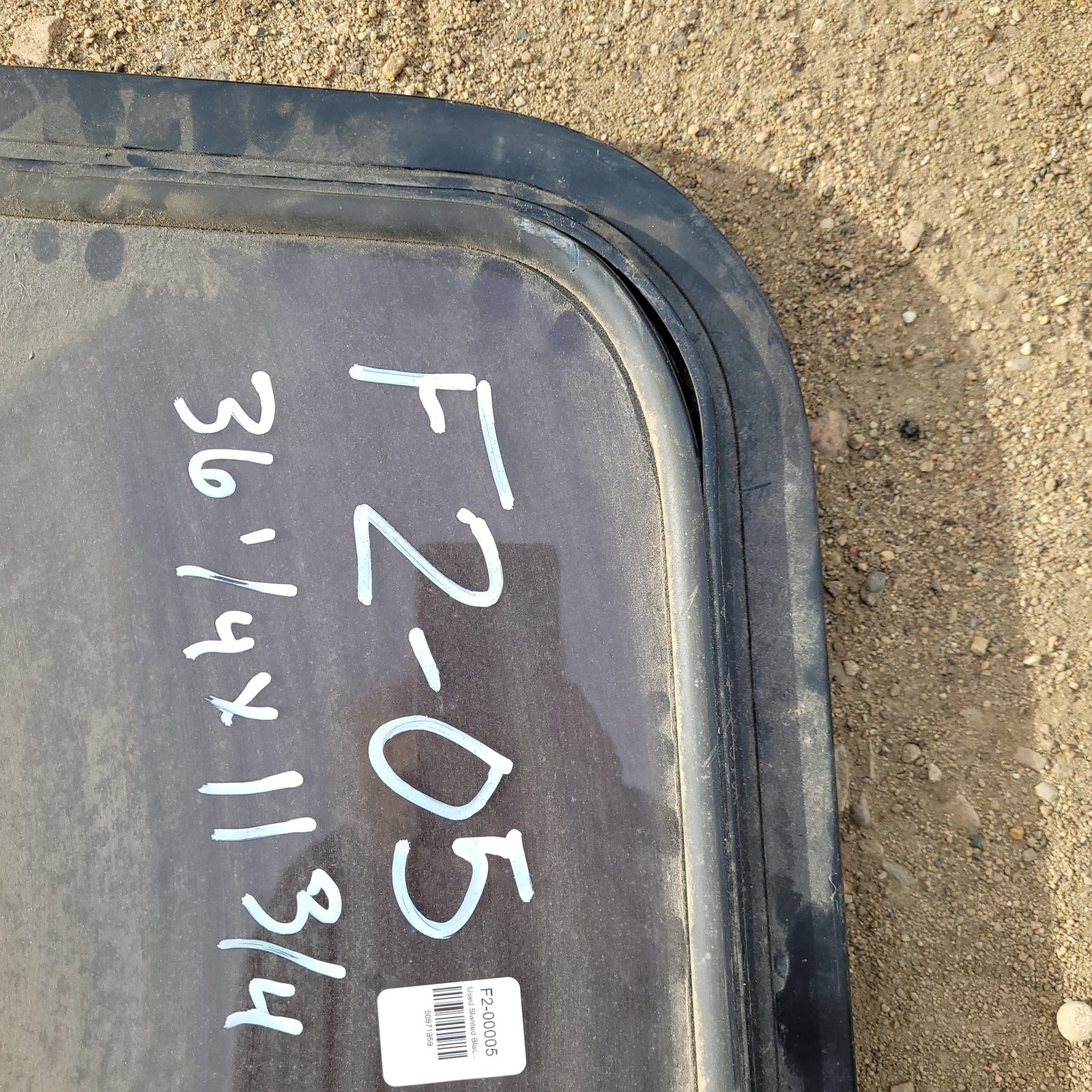 Used Slanted Black Radius Non- Opening Window : 36 1/4 X 11 3/4 X 2