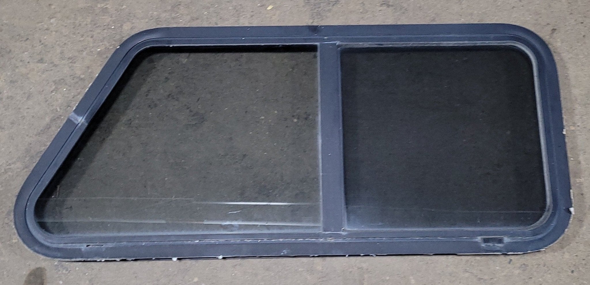 Used Slanted Black Radius Opening Window : 17 3/4" H X 42" W X 2" D - Young Farts RV Parts