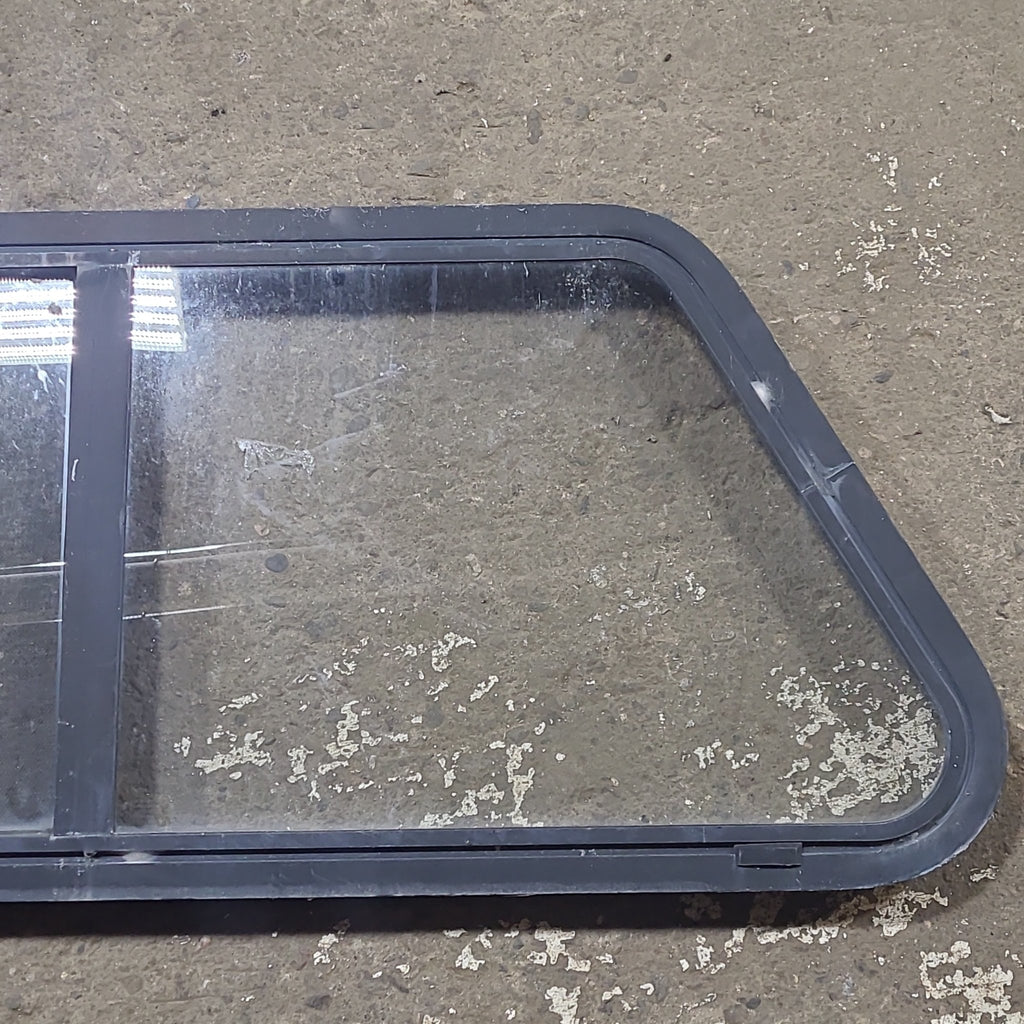 Used Slanted Black Radius Opening Window : 41 3/4" W x 17 3/4" H x 1 7/8" D - Young Farts RV Parts