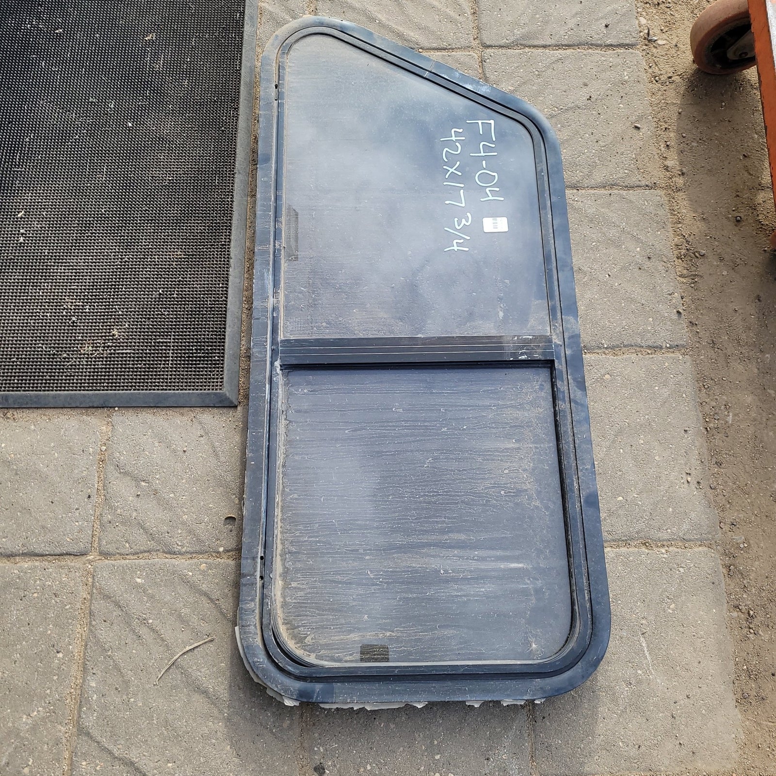 Used Slanted Black Radius Opening Window : 42 X 17 3/4 X 2