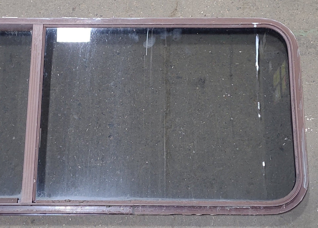 Used Slanted Brown Radius Opening Window : 22 1/8" H X 58 3/4" W X 2" D - Young Farts RV Parts