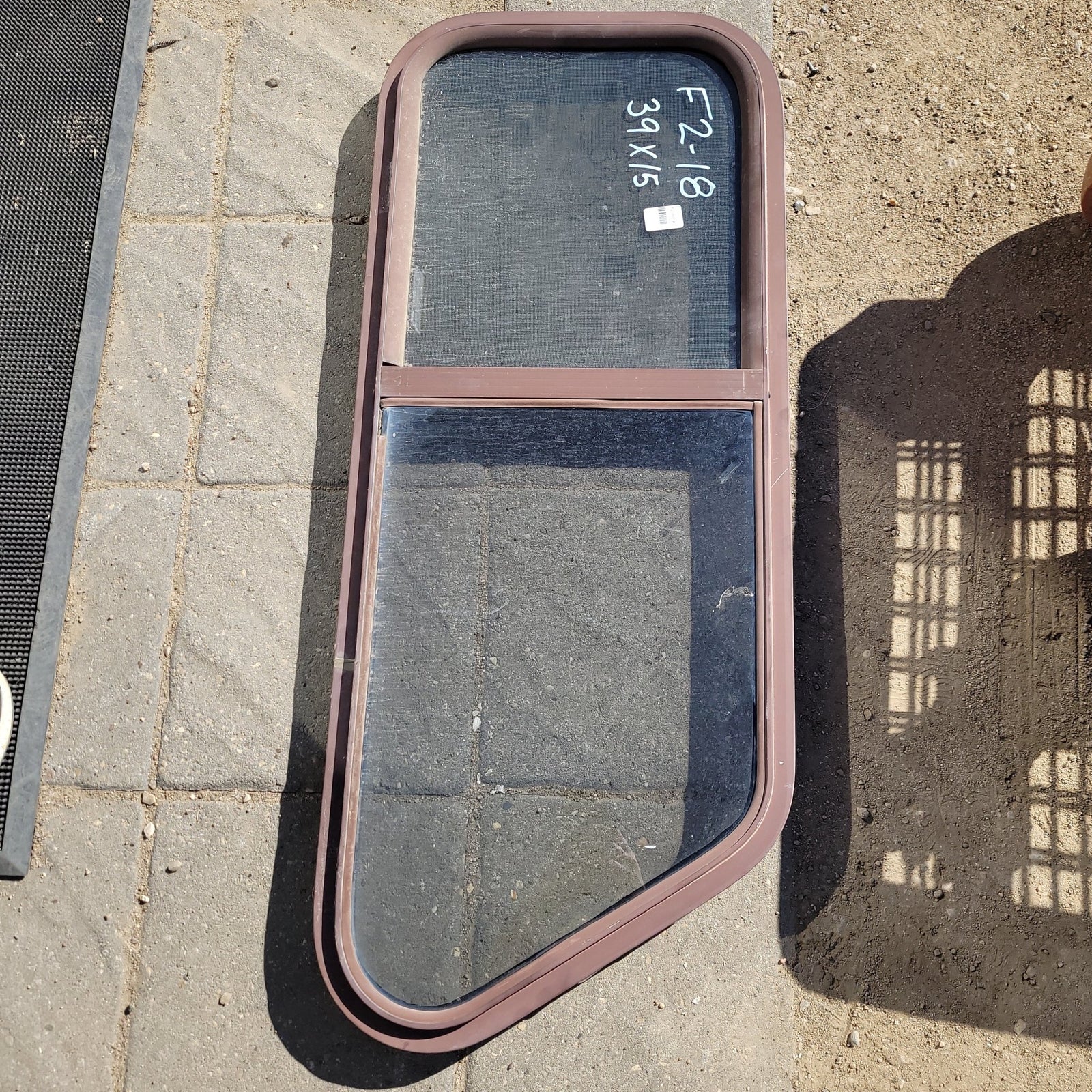 Used Slanted Brown Radius Opening Window : 39 X 15 X 2