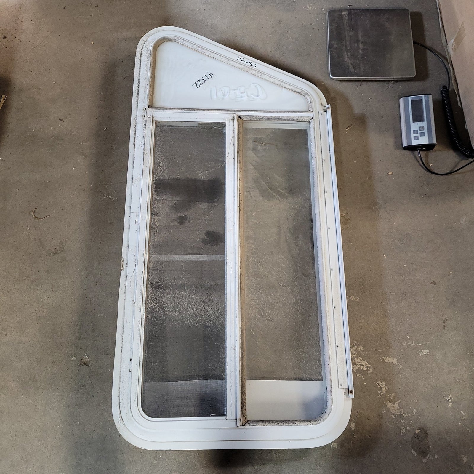Used Slanted White Radius Emergency Opening Window : 47 X 22 X 2
