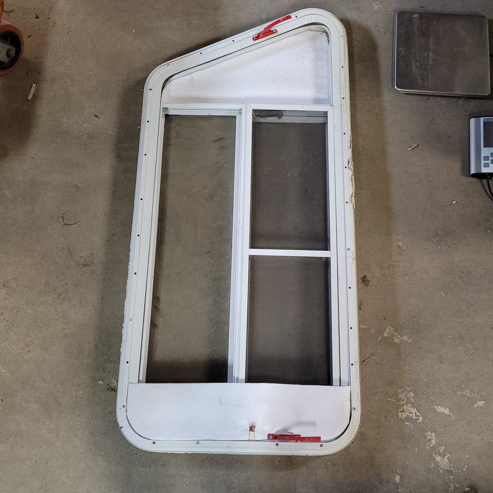 Used Slanted White Radius Emergency Opening Window : 47 X 22 X 2