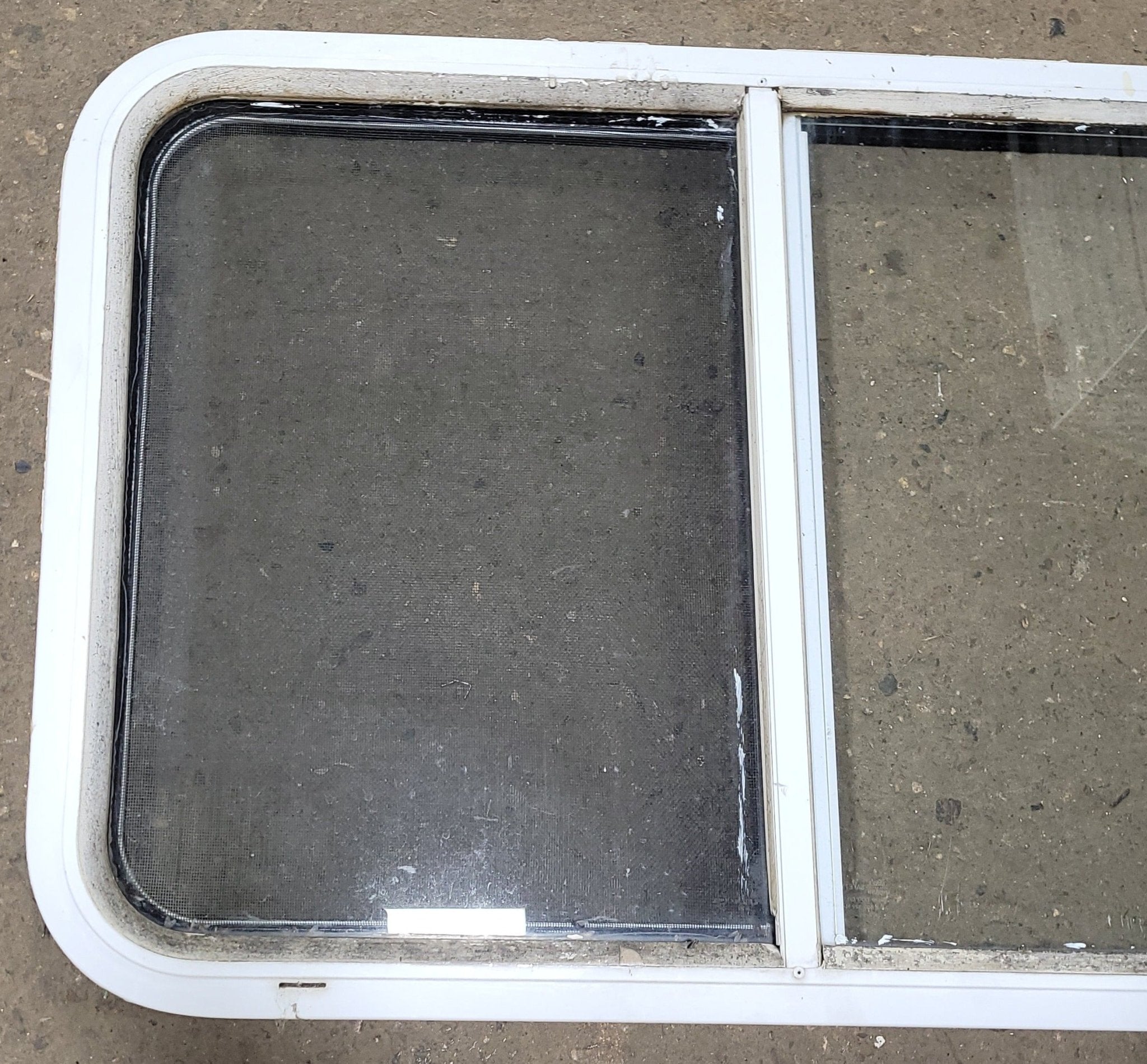 Used Slanted White Radius Opening Window : 21 1/2" H X 41" W X 2" D - Young Farts RV Parts