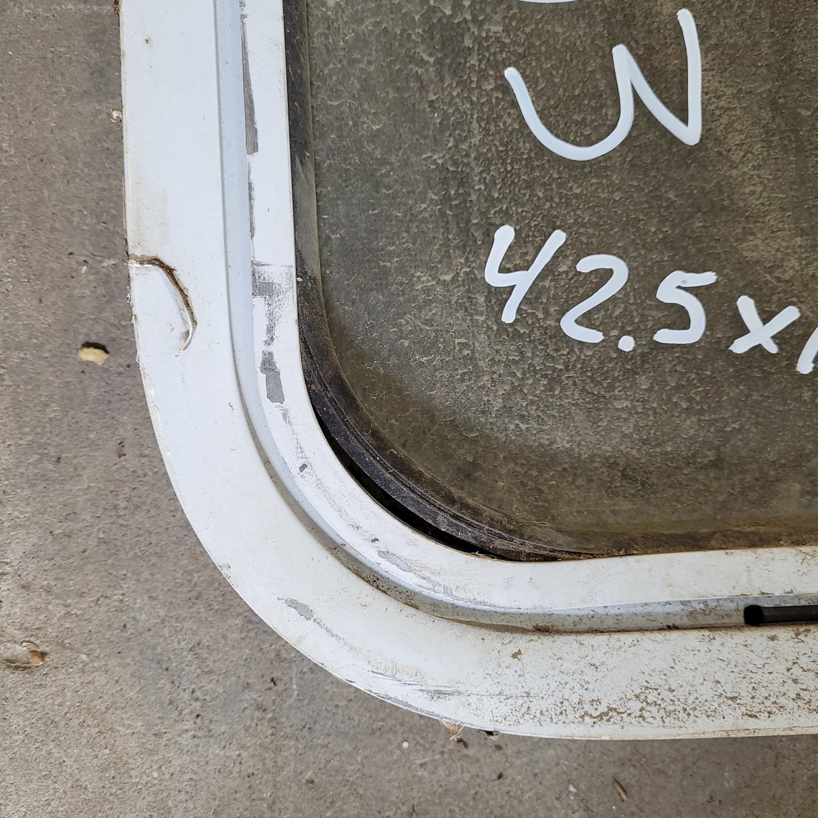 Used Slanted White Radius Opening Window : 42.5 X 16 X 2