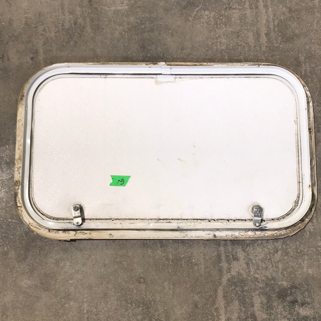 Used White Corner radius cargo door 23 3/4" W x 13 3/4" H x 1"D - Young Farts RV Parts