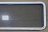 Used White Radius Non Opening Window : 54 1/4" W x 21 3/4" H x 1 7/8" D - Young Farts RV Parts