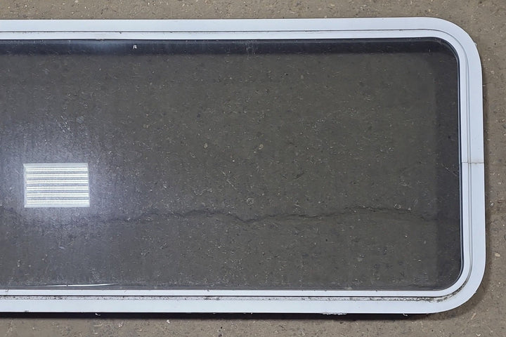 Used White Radius Non Opening Window : 54 1/4" W x 21 3/4" H x 1 7/8" D - Young Farts RV Parts