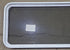 Used White Radius Non Opening Window : 54 1/4" W x 21 3/4" H x 1 7/8" D - Young Farts RV Parts