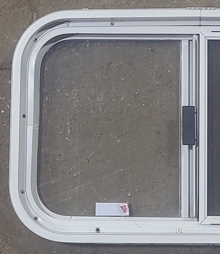 Used White Radius Opening Window : 23 1/2" W x 14 1/2" H x 1 7/8" D - Young Farts RV Parts