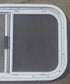 Used White Radius Opening Window : 23 1/2" W x 14 1/2" H x 1 7/8" D - Young Farts RV Parts