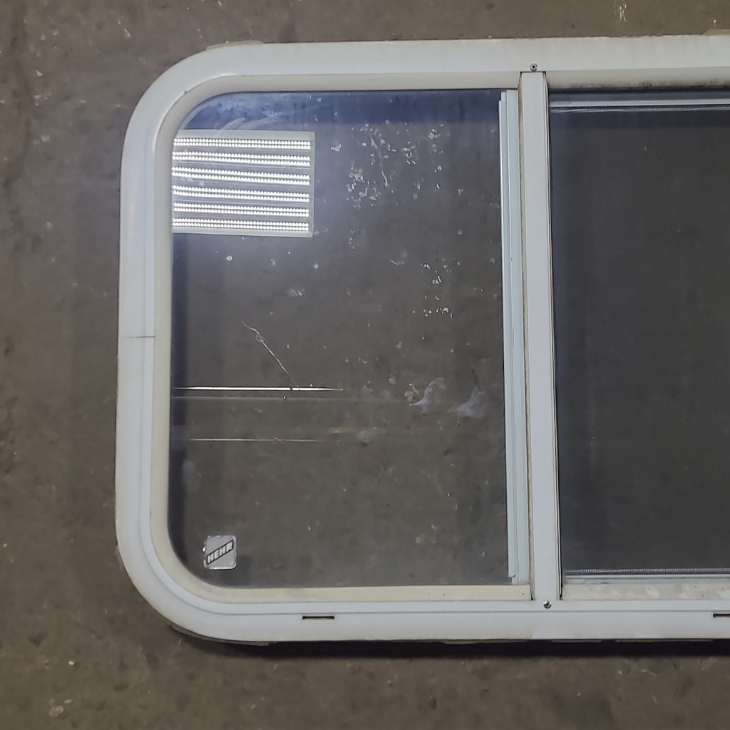 Used White Radius Opening Window : 24 1/4" W x 17 3/4" H x 1 3/4" D - Young Farts RV Parts