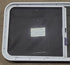 Used White Radius Opening Window : 45 1/4" W x 21 1/2" H x 1 3/4" D - Young Farts RV Parts