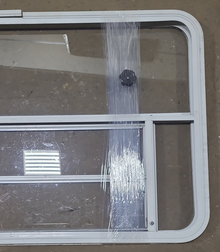 Used White Radius Opening Window : 47 3/4" W x 28 1/4" H x 1 5/8" D - Young Farts RV Parts